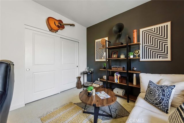 living room featuring vaulted ceiling and light carpet