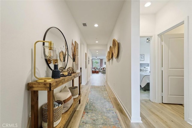 hall featuring light hardwood / wood-style flooring