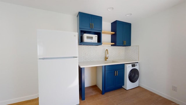 laundry room with washer / clothes dryer and sink