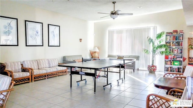 playroom with light tile patterned flooring and ceiling fan