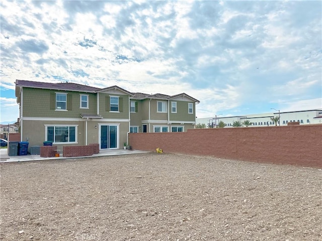 rear view of house with a patio area