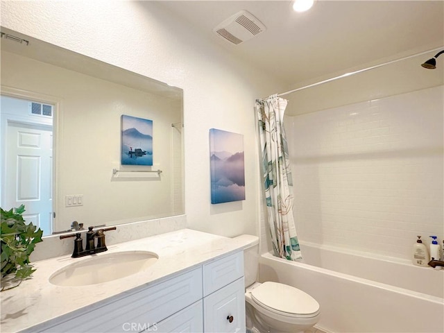 full bathroom featuring vanity, shower / tub combo, and toilet