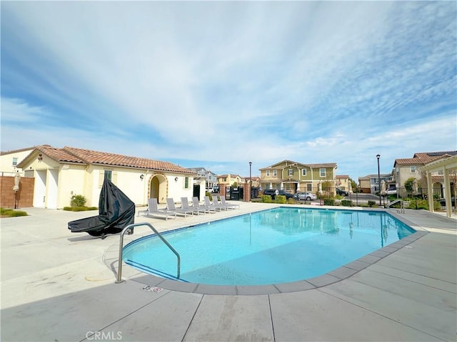 view of pool featuring a patio area