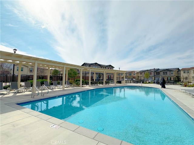 view of swimming pool featuring a patio