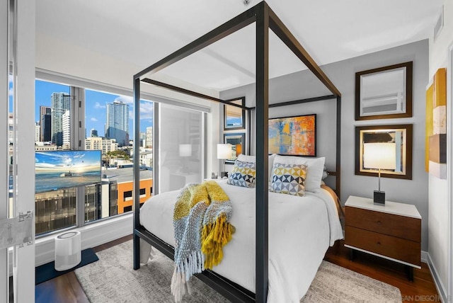 bedroom featuring hardwood / wood-style flooring