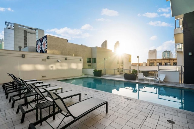 view of swimming pool featuring a patio