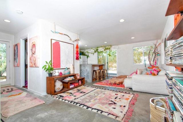 interior space with a wealth of natural light and concrete floors