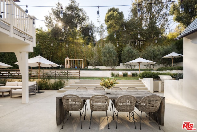 view of patio / terrace featuring a balcony and outdoor lounge area