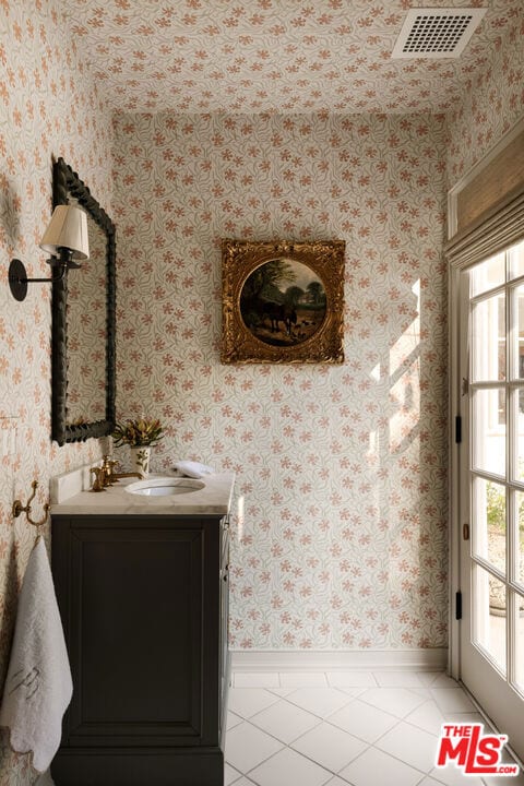 bathroom featuring vanity and tile patterned floors