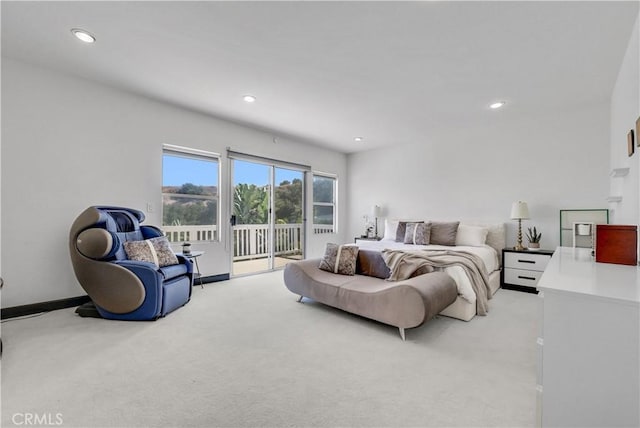 carpeted bedroom featuring access to outside