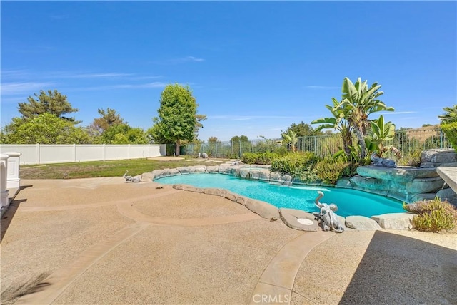 view of swimming pool featuring a patio and pool water feature