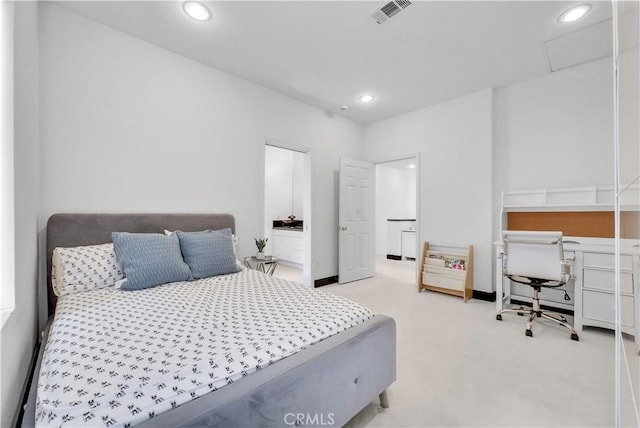 bedroom featuring light carpet