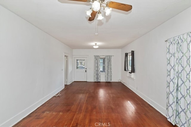 foyer entrance with wood-type flooring and ceiling fan