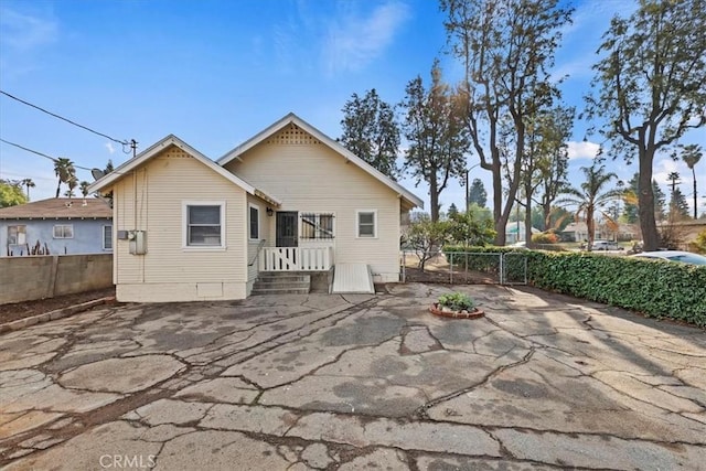 rear view of house featuring a patio