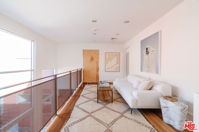 living area featuring hardwood / wood-style floors