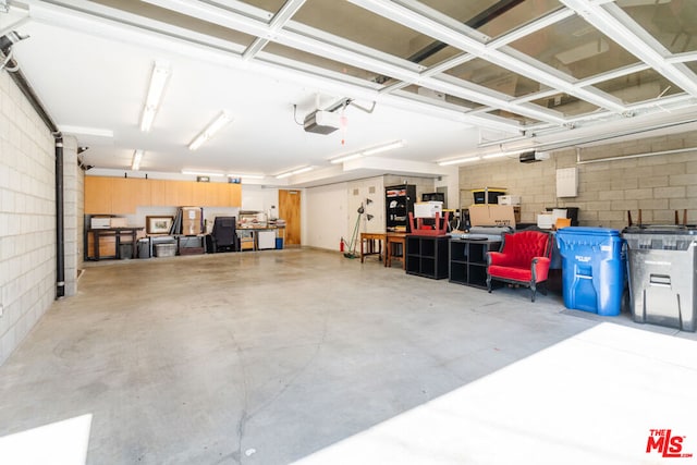 garage featuring a garage door opener