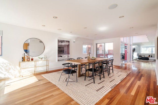 dining room featuring wood-type flooring