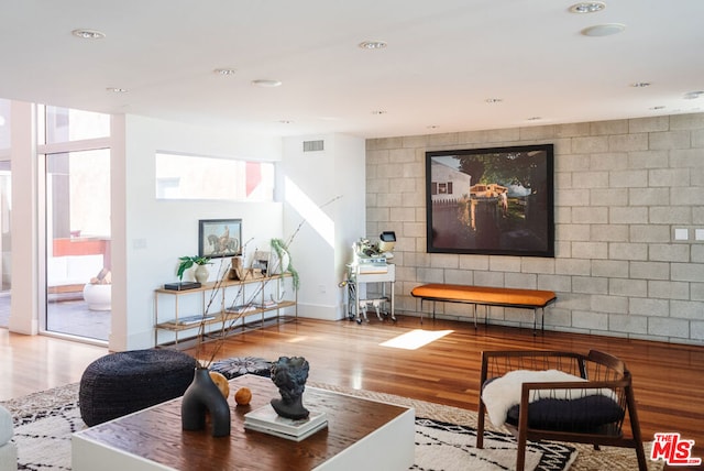 living room with light hardwood / wood-style floors