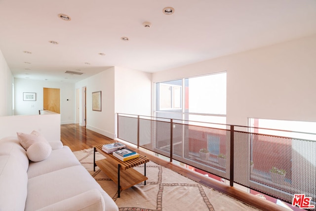 living room with light hardwood / wood-style flooring