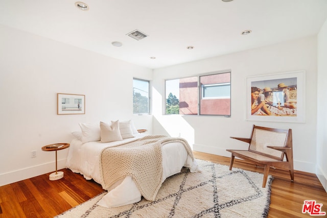 bedroom with light hardwood / wood-style flooring