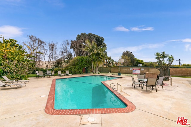 view of pool with a patio