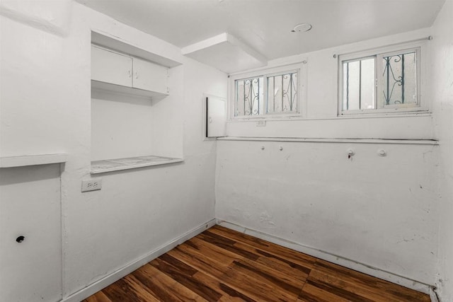 interior space with dark hardwood / wood-style flooring