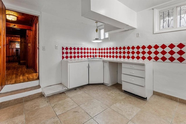 kitchen with sink and decorative light fixtures