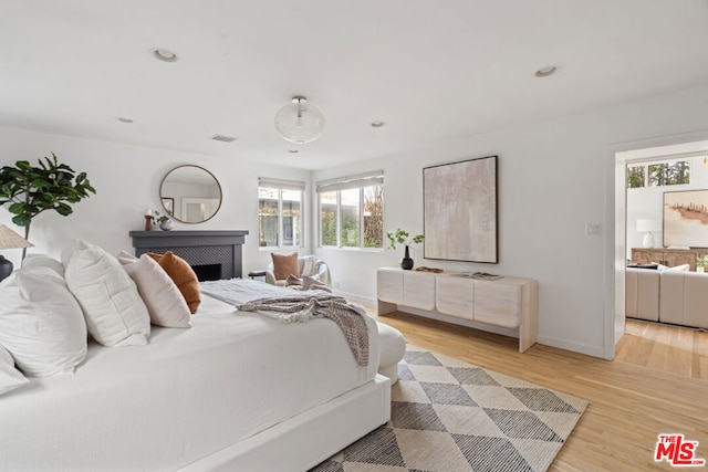 bedroom featuring light hardwood / wood-style flooring