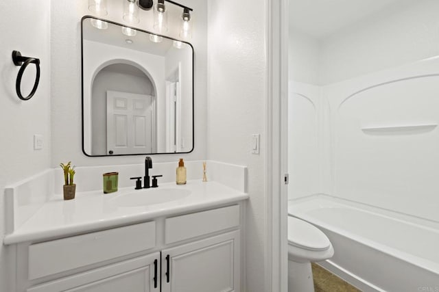 full bathroom featuring vanity, toilet, and shower / washtub combination