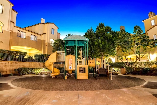 view of playground at dusk