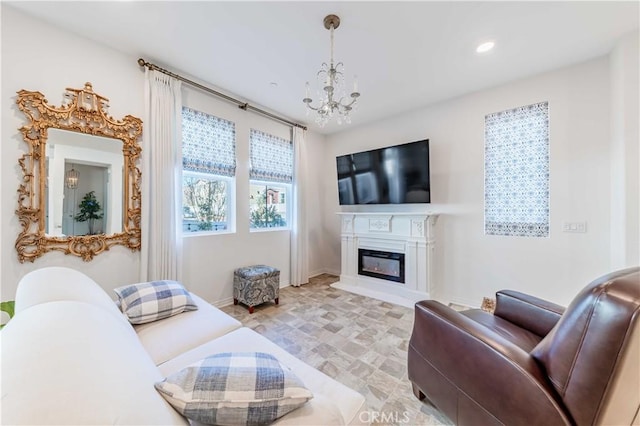 living room with a notable chandelier