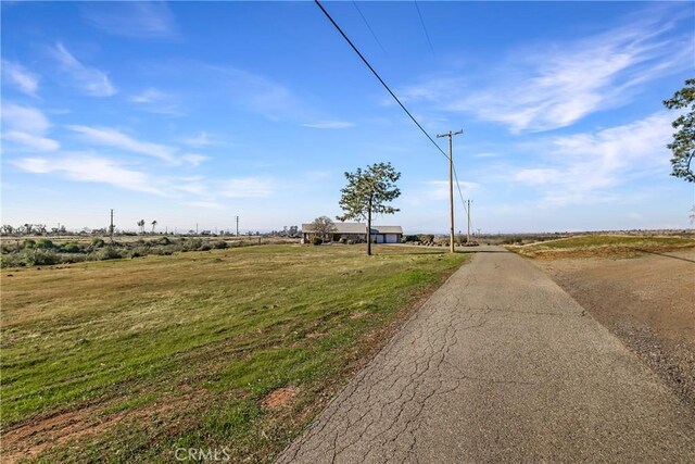 view of street featuring a rural view