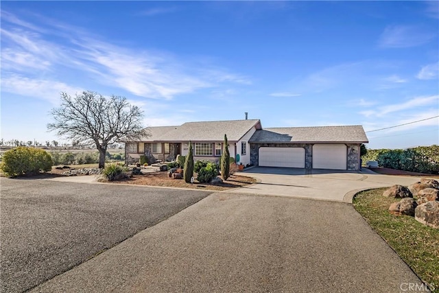 ranch-style house with a porch and a garage