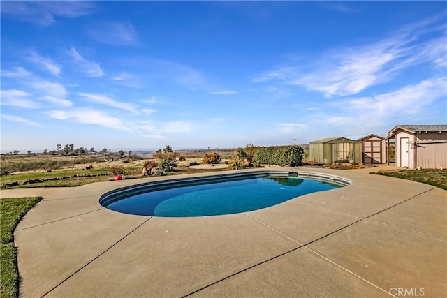 view of swimming pool with a patio area