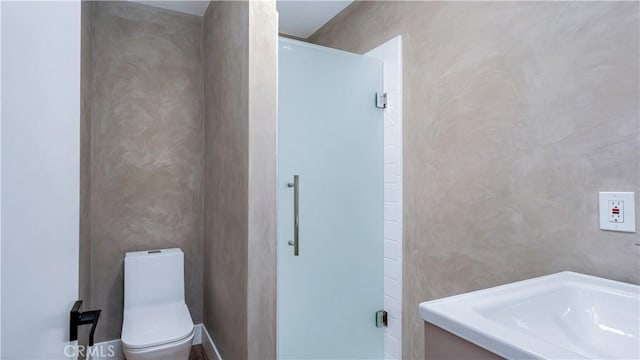 bathroom with sink and toilet