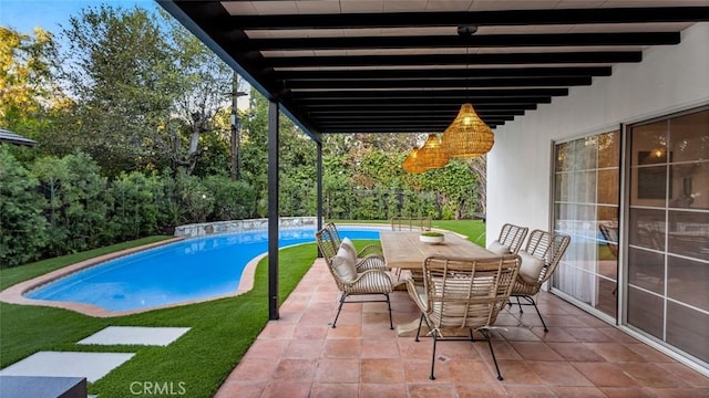 view of swimming pool featuring a patio area