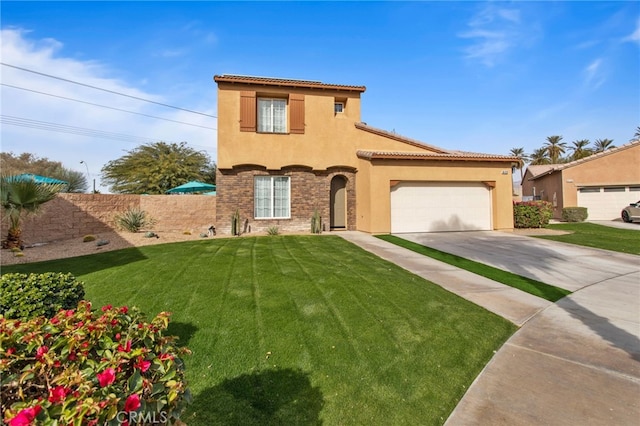 mediterranean / spanish house featuring a garage and a front lawn