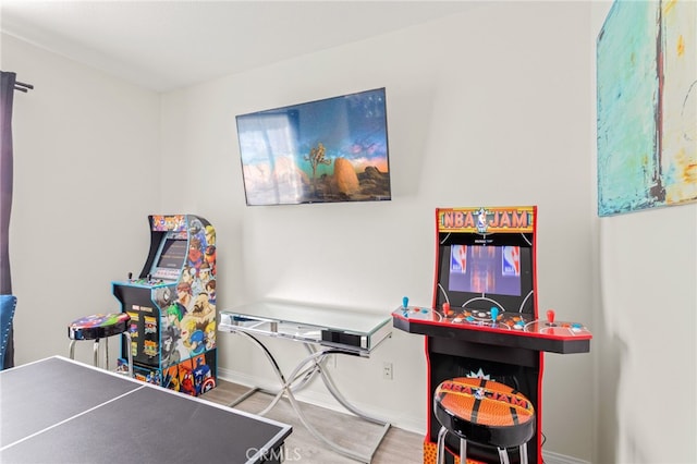 recreation room featuring wood-type flooring