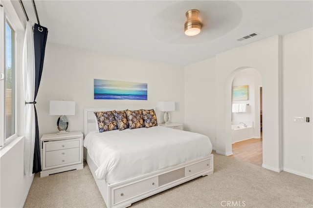 bedroom with light colored carpet and ceiling fan