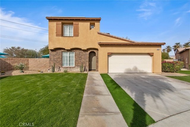 mediterranean / spanish-style home featuring a garage and a front yard