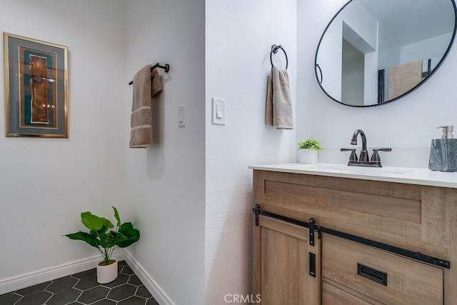 bathroom with vanity and tile patterned floors