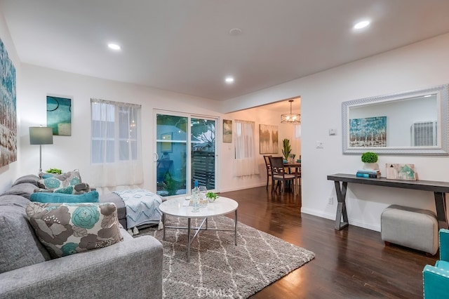 living room featuring dark wood-type flooring