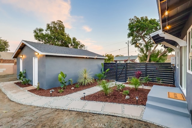 view of property exterior at dusk