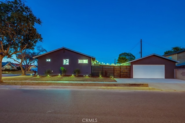 single story home with a garage