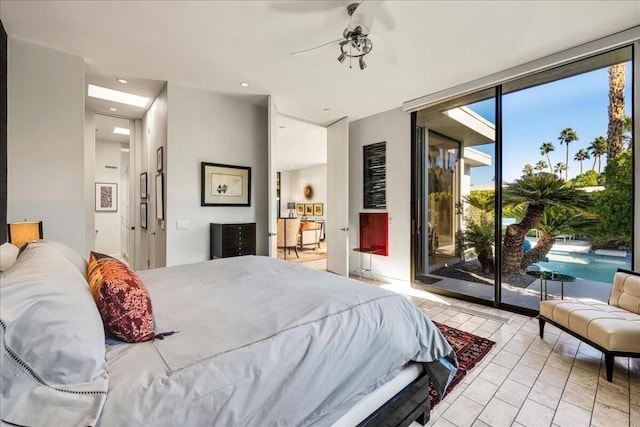 tiled bedroom featuring ceiling fan, a wall of windows, and access to exterior