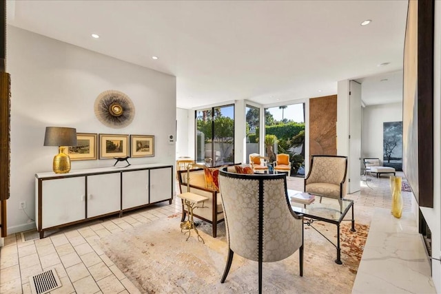 dining space with expansive windows