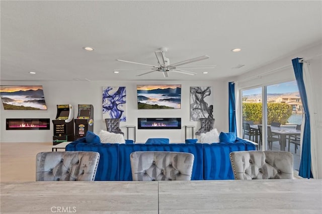 living room featuring ceiling fan