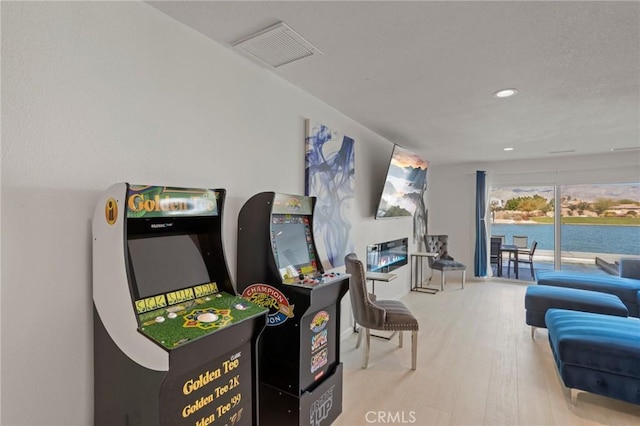 game room featuring wood-type flooring