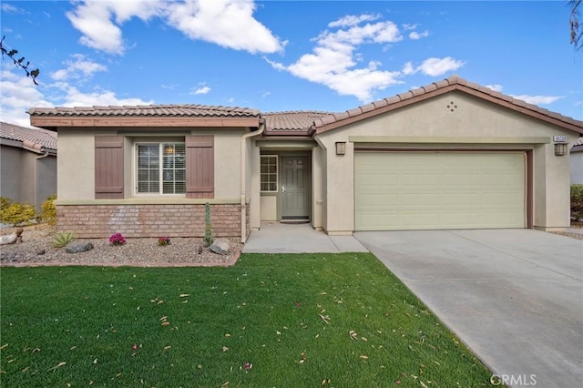 view of front of house featuring a garage and a front yard