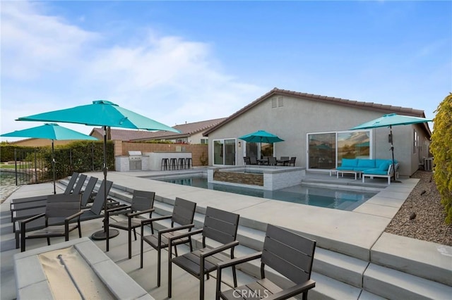 view of swimming pool featuring outdoor lounge area and an outdoor bar